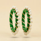  "Set of two green silk thread bangles with pearl beads and gold zari"