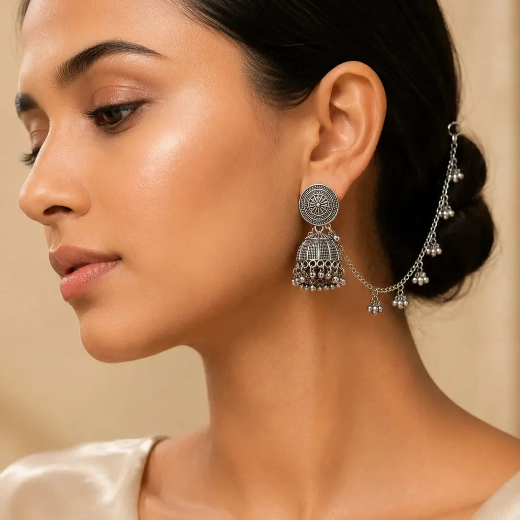 Close-up of a woman wear  earrings with Lightweight oxidized danglers for ethnic outfits