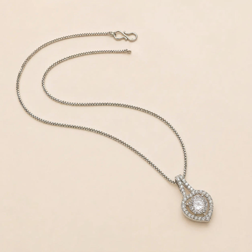 Silver heart halo CZ pendant necklace laid out showing full box chain and S-hook clasp
