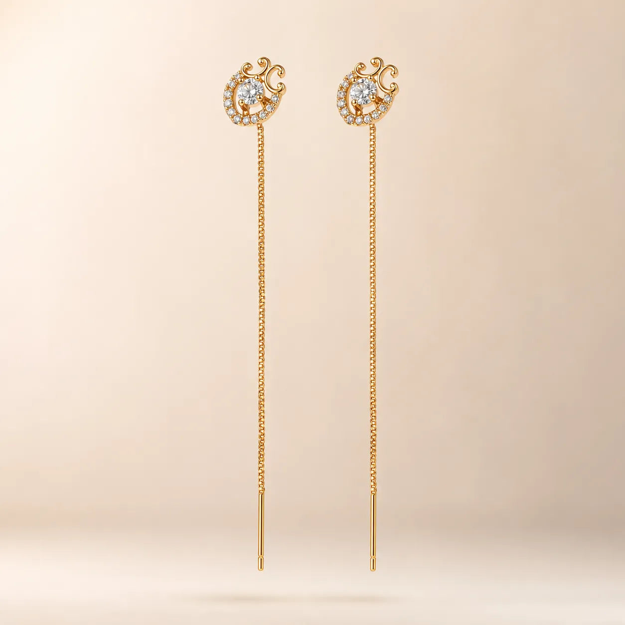 "Pair of gold vintage halo CZ threader earrings with long chain"