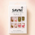 SAVNI press on nails packaging showing sage green and pink floral daisy design, 12 piece natural manicure set
