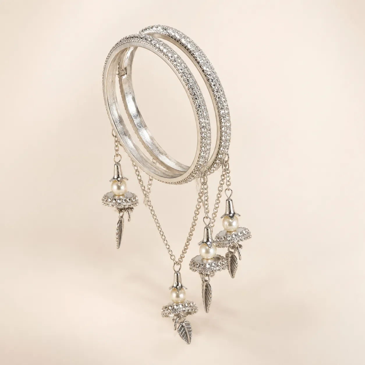 Silver CZ Pave Bangle Set with Hanging Jhumka Pearl & Feather Chain Drops | Diamond-Look Crystal Kada with Mini Bell Charms | Indian Bridal & Festive Jewelry for Women