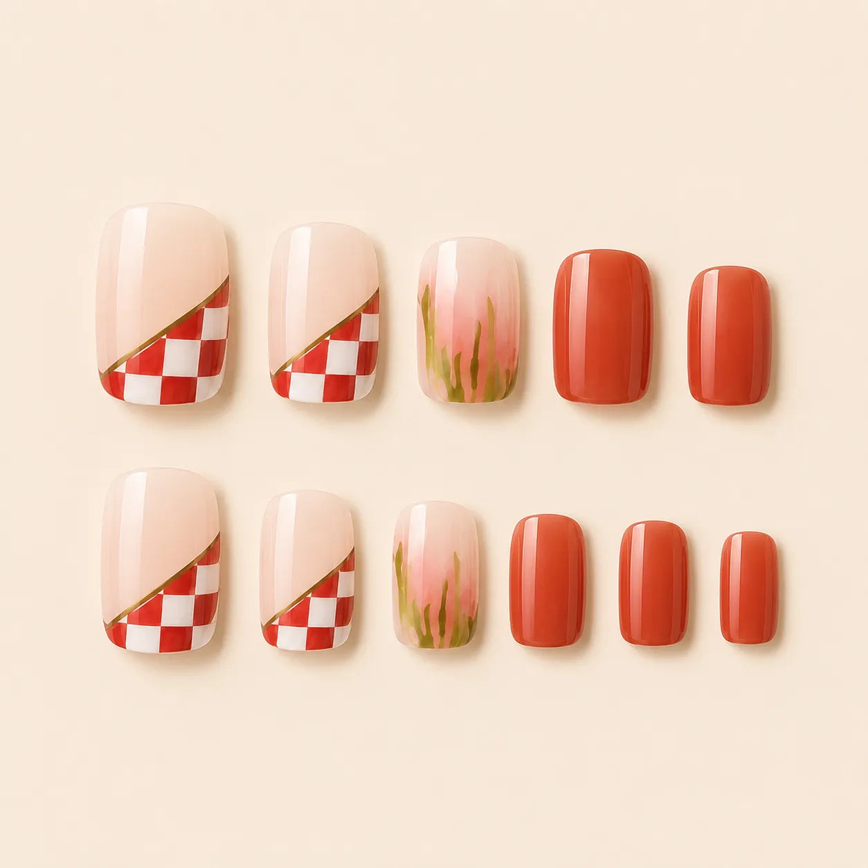 "Set of terracotta and red checkerboard press-on nails with floral accent"