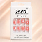  SAVNI press on nails packaging showing pink ombre nails with heart and dot design, 12 piece natural manicure set