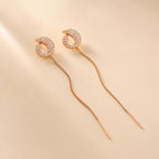 "Rose gold pave crystal earrings with chain threader detail"