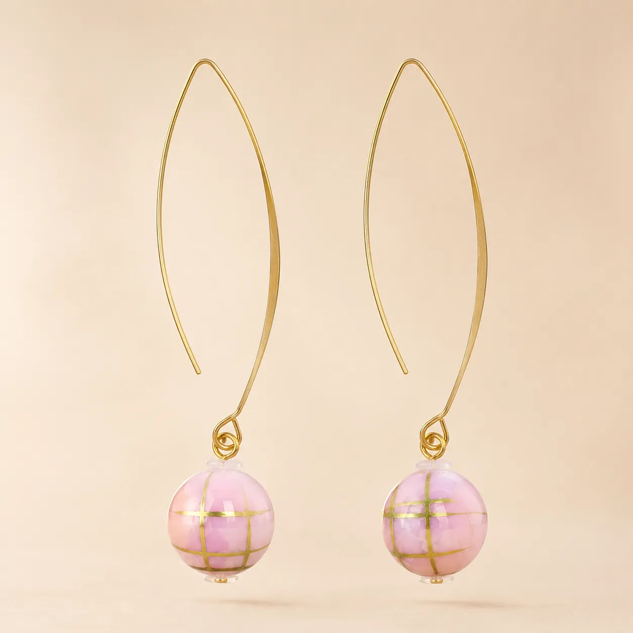 "Gold wire hook earrings with pink and lavender mosaic bead drop"