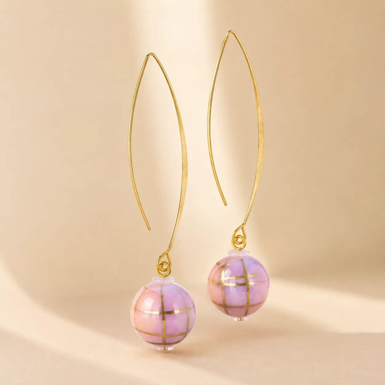 "Pair of pink mosaic bead earrings with gold marquise wire hooks"