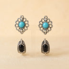 "Set of two stud earrings, turquoise flower design and black onyx leaf design"