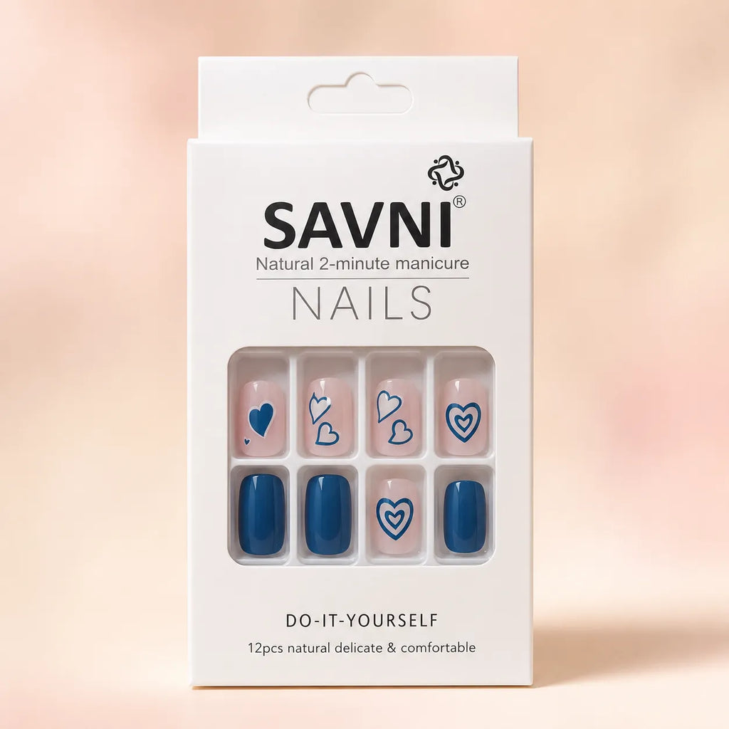 SAVNI Nails packaging box showing blue heart press-on nail design, natural 2-minute DIY manicure, 12-piece set