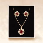 Ruby halo necklace and earring set displayed in gift box on black velvet insert