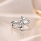  Close-up of silver two stone ring showing crossover double band and vertical CZ stones