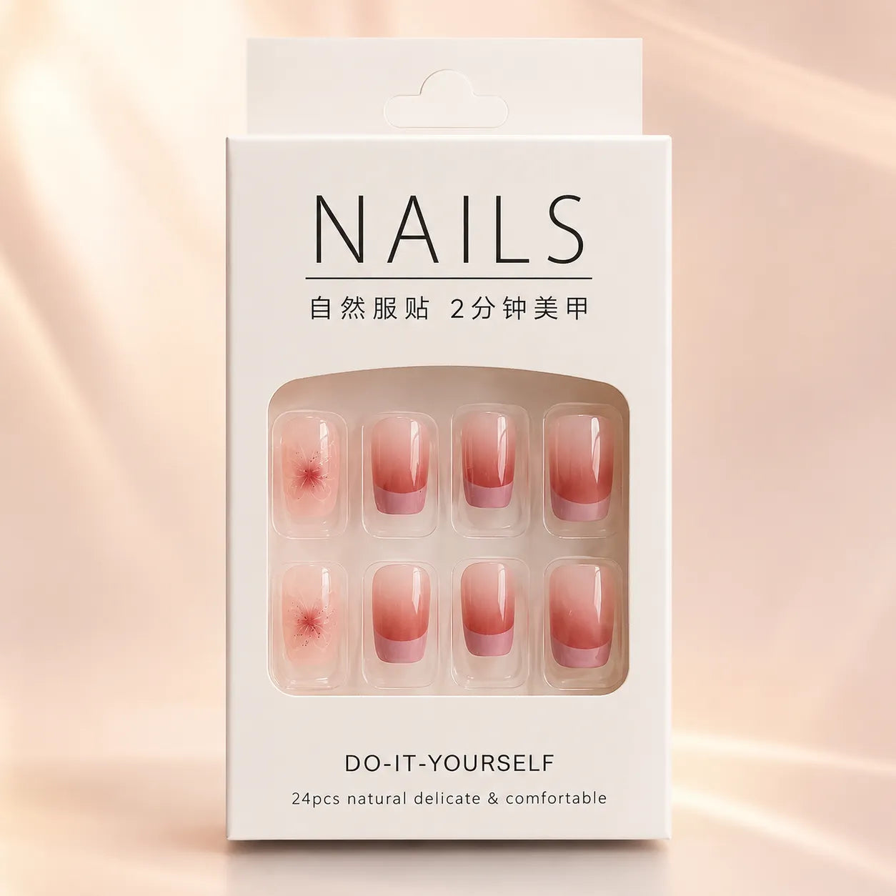 White retail box packaging of pink ombre French tip press-on nails set showing 24pcs natural delicate DIY nail kit