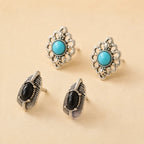 "Set of two stud earrings, turquoise flower design and black onyx leaf design"