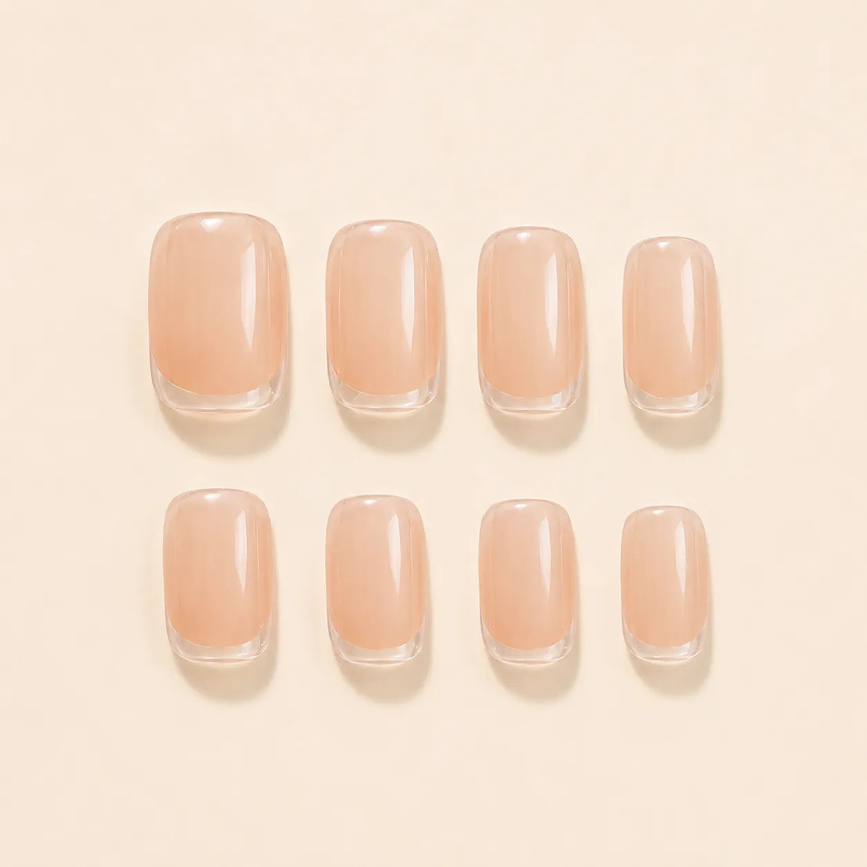 Sheer nude press on nails packaging showing 24 piece natural 2-minute manicure set with clear tip design