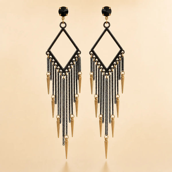 Black chandelier fringe earrings with gold spike charms, geometric diamond frame and black crystal stud, front view on beige background