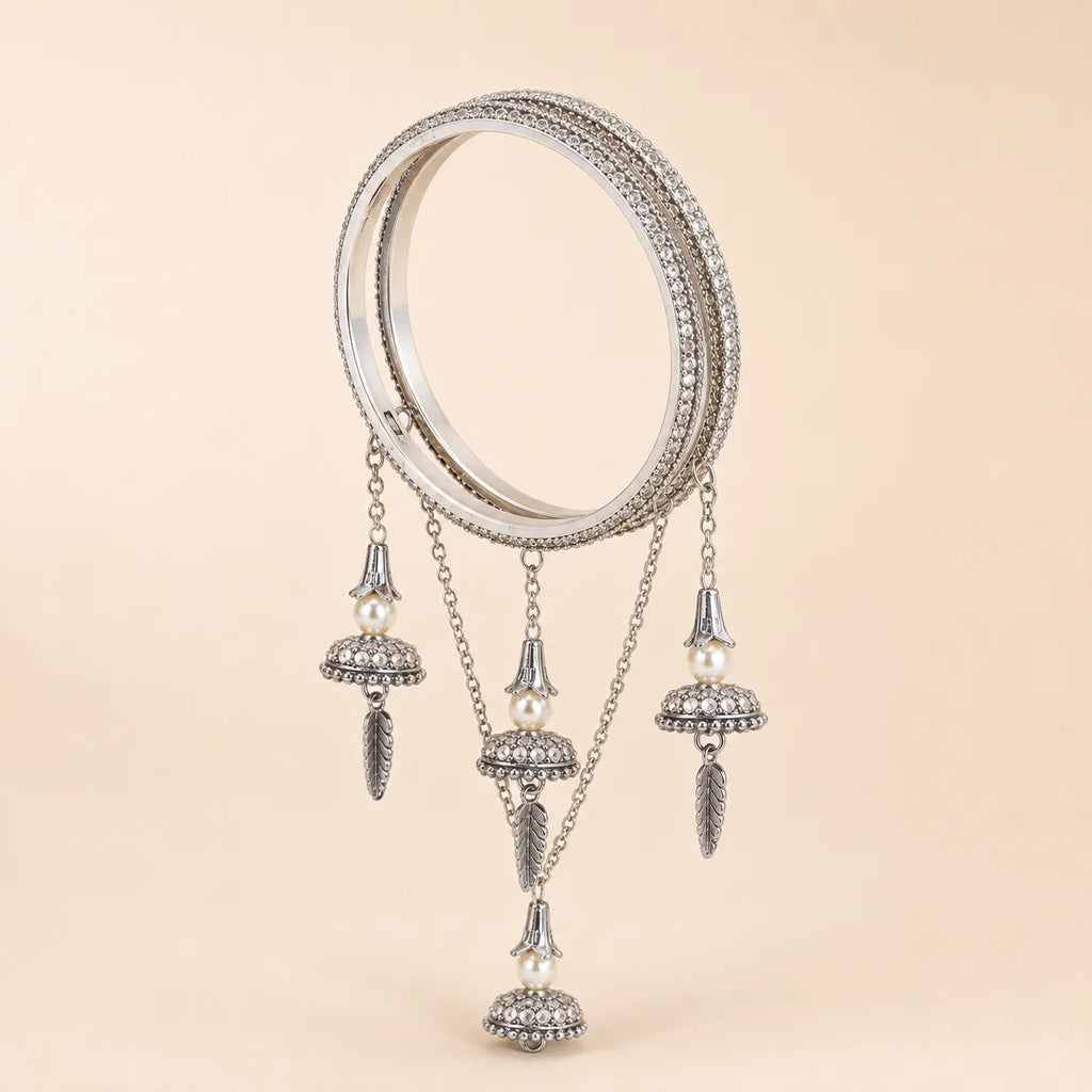 Silver CZ Pave Bangle Set with Hanging Jhumka Pearl & Feather Chain Drops | Diamond-Look Crystal Kada with Mini Bell Charms | Indian Bridal & Festive Jewelry for Women