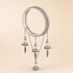 Silver CZ Pave Bangle Set with Hanging Jhumka Pearl & Feather Chain Drops | Diamond-Look Crystal Kada with Mini Bell Charms | Indian Bridal & Festive Jewelry for Women